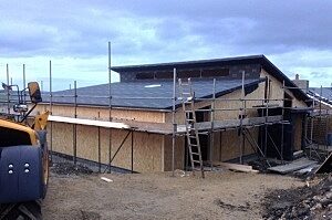 Photo: Couple Builds House in the Garden Using SIPs